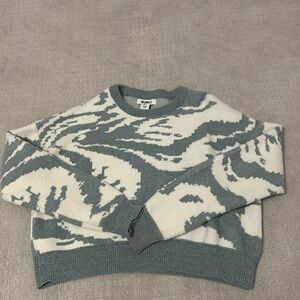 green and white sweater